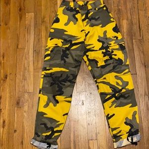 Yellow, olive green, and black camo pants